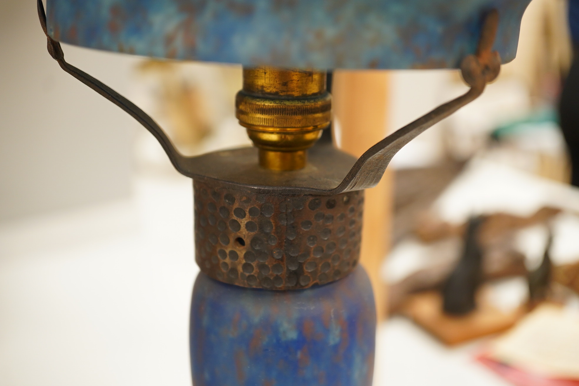 Art Nouveau, ‘Delatte’ mushroom blue glass lamp with hammered metal mount, 45cm high. Condition - good